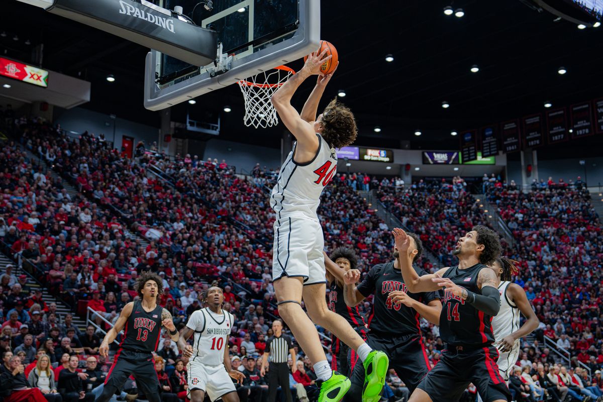 Sophomore Forward Miles Heide #40 dunking the ball in a conference game against UNLV at Viejas Arena in San Diego, CA on January 18, 2025