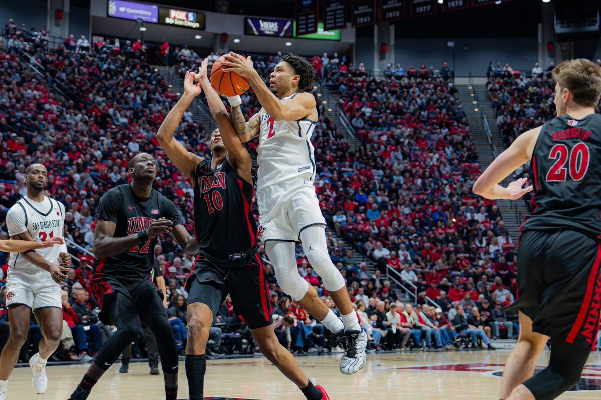 Senior Guard Nick Boyd #2 driving to the basket in a conference game against UNLV at Viejas Arena in San Diego, CA on January 18, 2025