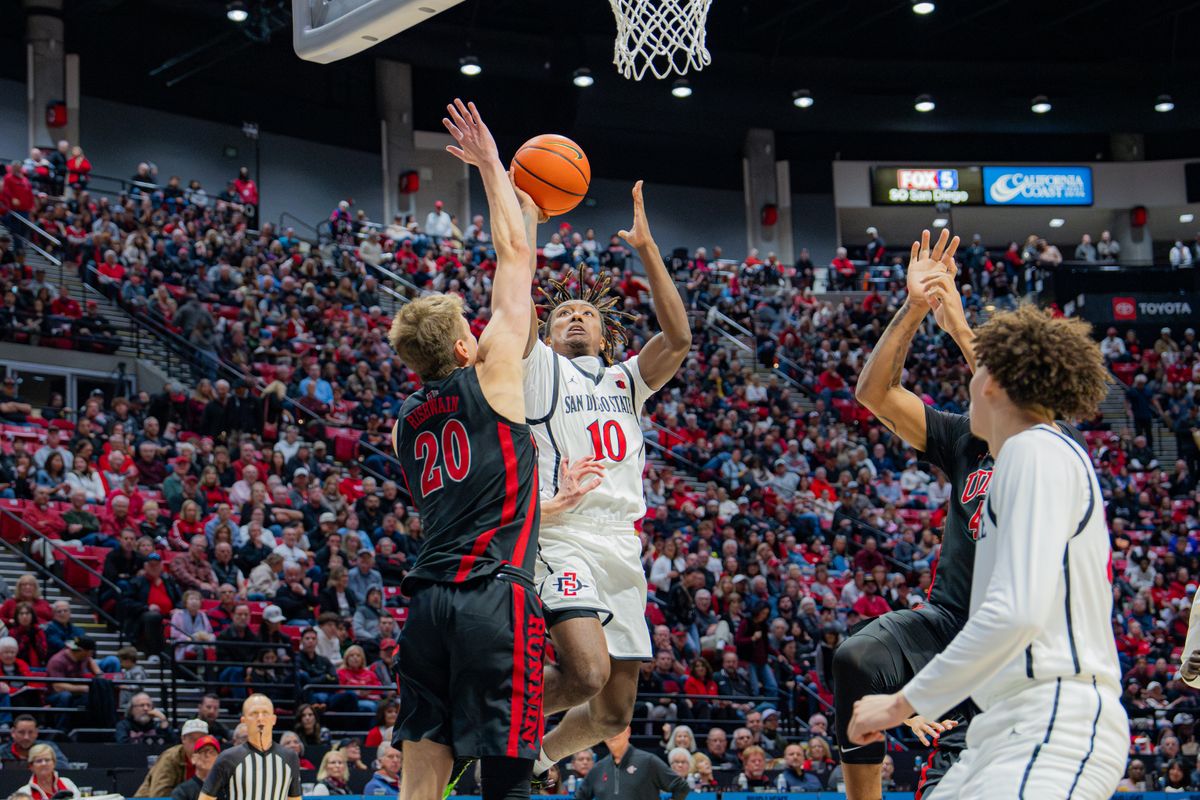 Sophomore Guard BJ Davis #10 going straight to the basket in a conference game against UNLV at Viejas Arena in San Diego, CA on January 18, 2025
