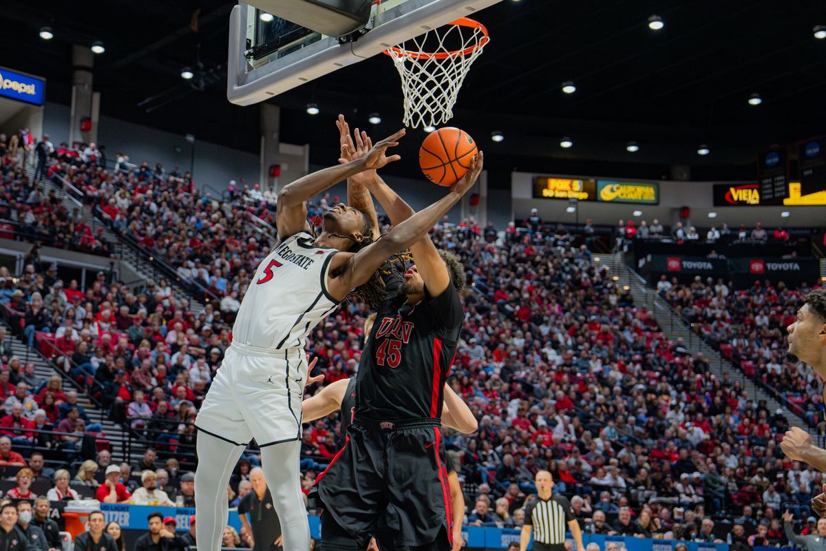 Freshman Forward Pharaoh Compton #5 shooting a layup in a conference game against UNLV at Viejas Arena in San Diego, CA on January 18, 2025