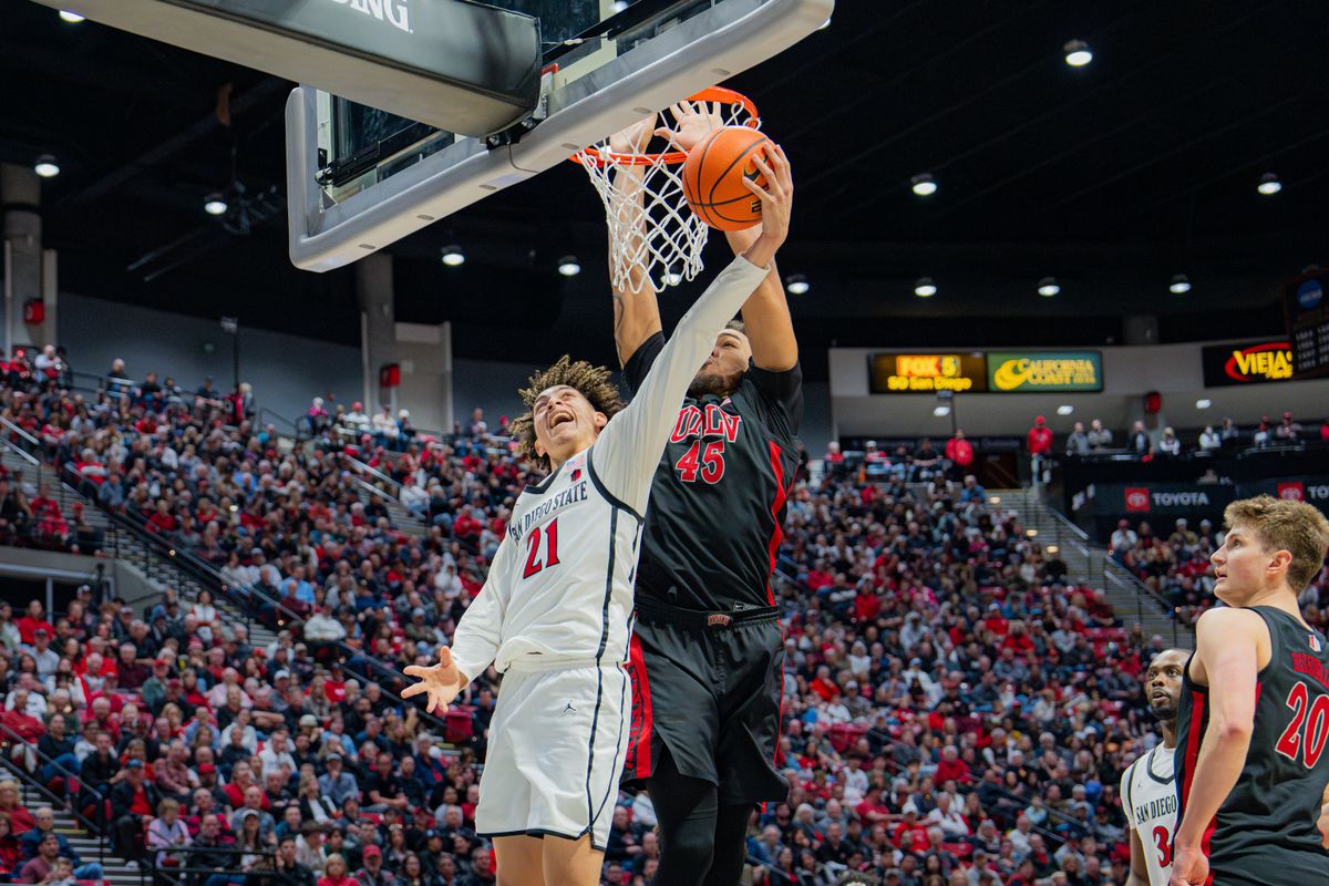 Sophomore Guard Miles Byrd #21 going for a layup in a conference game against UNLV at Viejas Arena in San Diego, CA on January 18, 2025