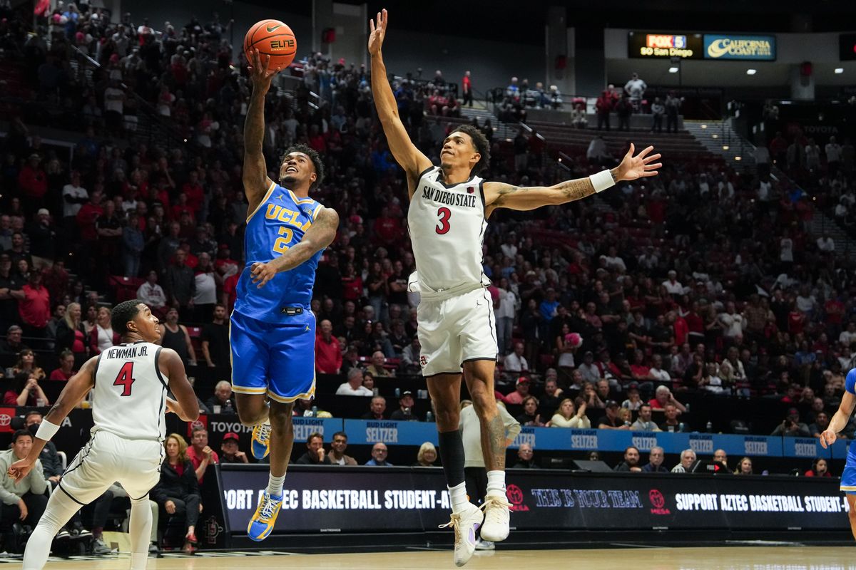 UCLA guard Donovan Dent (2) goes up for a layup during an NCAA basketball game against SDSU, Friday October 17, 2025 in San Diego, California.