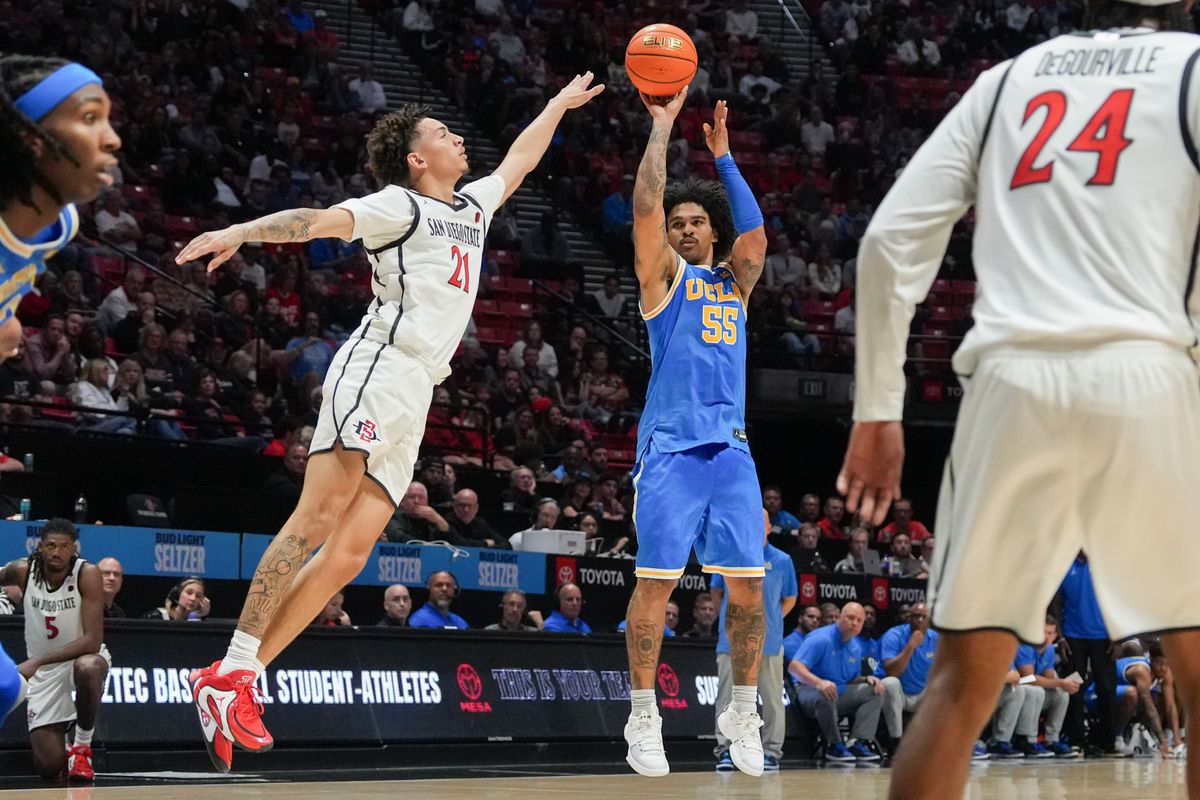 UCLA guard Skyy Clark (55) shoots a three during an NCAA basketball game against SDSU, Friday October 17, 2025 in San Diego, California.