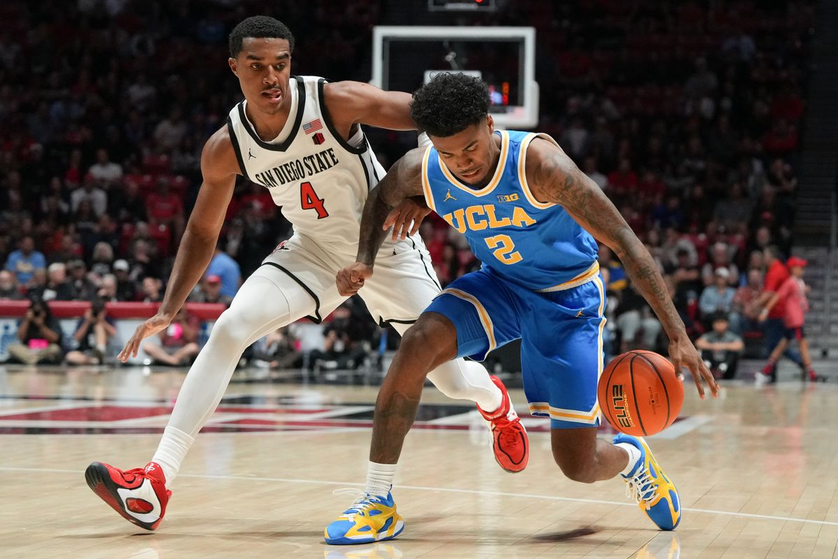 UCLA guard Donovan Dent (2) picks up his dribble during an NCAA basketball game against SDSU, Friday October 17, 2025 in San Diego, California.