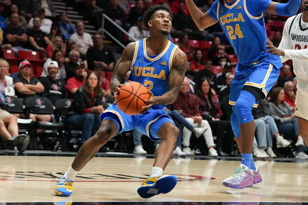 UCLA guard Donovan Dent (2) goes up for a layup during an NCAA basketball game against SDSU, Friday October 17, 2025 in San Diego, California.
