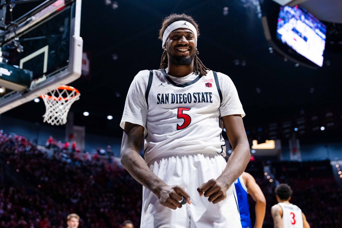 San Diego State forward Pharoah Compton (5) celebrates a dunk during an NCAA Basketball game between Air Force and San Diego State, Wednesday December 17, 2025 at Viejas Arena in San Diego, Calif.