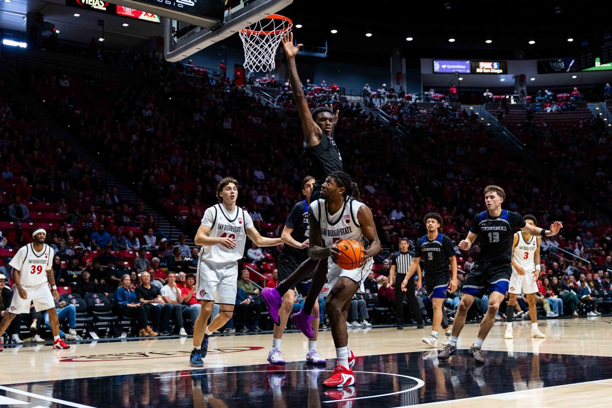 San Diego State forward Pharoah Compton (5) looks to shoot during an NCAA Basketball game between Whittier and San Diego State, Monday December 22, 2025 at Viejas Arena in San Diego, Calif.