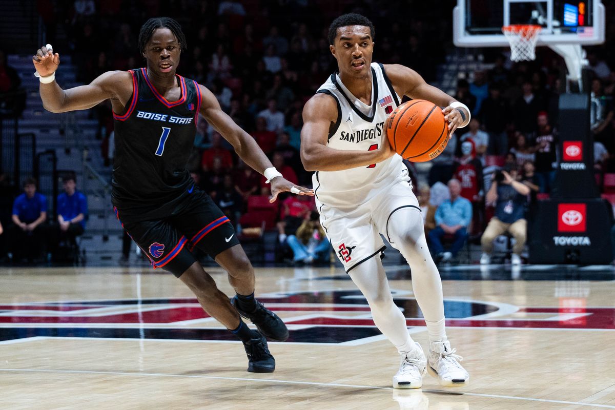 San Diego State guard Sean Newman Jr. (4) passes during an NCAA Basketball game between Boise State and San Diego State, Saturday January 3, 2026 at Viejas Arena in San Diego, Calif.