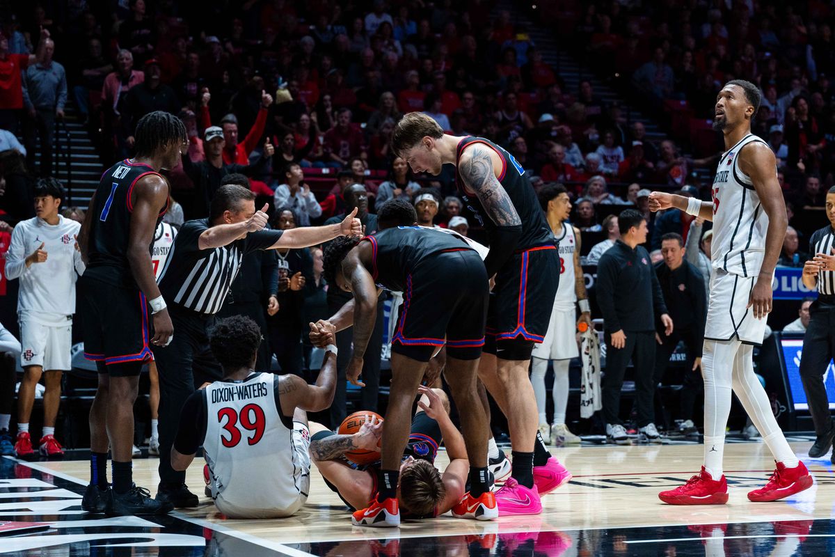A referee signals a jump ball during an NCAA Basketball game between Boise State and San Diego State, Saturday January 3, 2026 at Viejas Arena in San Diego, Calif.