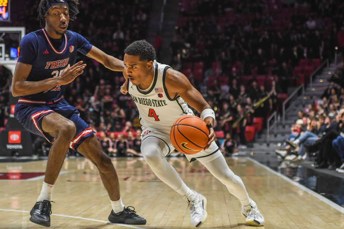 SDSU  Sean Newman Jr. (4) drives to the basket during an NCAA men’s basketball game against  Fresno State.  Saturday January 10, 2026 in  San Diego, California.