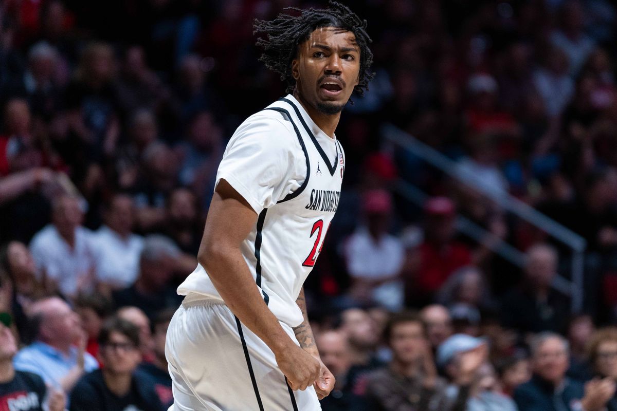 San Diego State guard Taj DeGourville (24) celebrates during an NCAA Basketball game between New Mexico and San Diego State, Saturday January 17, 2026 at Viejas Arena in San Diego, Calif.