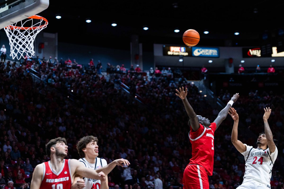 San Diego State guard Taj DeGourville (24) fades away during an NCAA Basketball game between New Mexico and San Diego State, Saturday January 17, 2026 at Viejas Arena in San Diego, Calif.