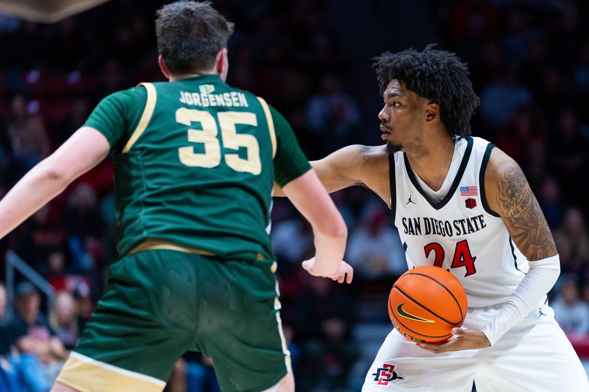 San Diego State guard Taj DeGourville (24) looks to pass during an NCAA Basketball game between Colorado State and San Diego State, Wednesday January 28, 2026 at Viejas Arena in San Diego, Calif.