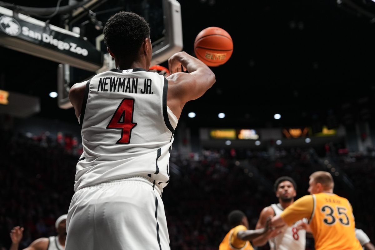 SDSU guard Sean Newman Jr. (4) passes the ball during an NCAA basketball game against Wyoming, Tuesday February 03, 2026 in San Diego, California.
