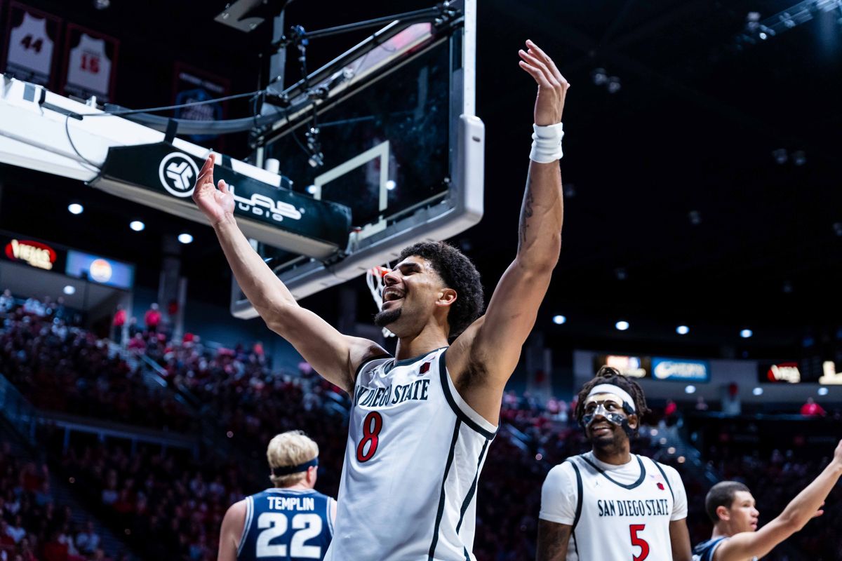 San Diego State forward Tae Simmons (8) hypes up the crowd during an NCAA Basketball game between Utah State and San Diego State, Wednesday February 25, 2026 at Viejas Arena in San Diego, Calif.