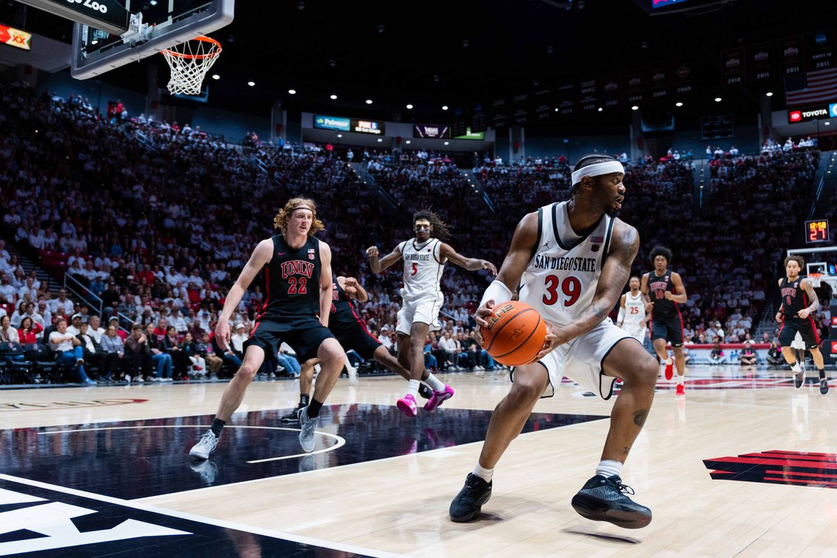 San Diego State guard Reese Dixon-Waters (39) saves the ball during an NCAA Basketball game between UNLV and San Diego State, Friday March 6, 2026 at Viejas Arena in San Diego, Calif.
