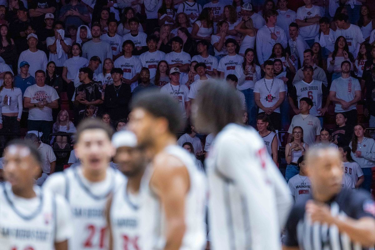 San Diego State fans wear white during an NCAA Basketball game between UNLV and San Diego State, Friday March 6, 2026 at Viejas Arena in San Diego, Calif.