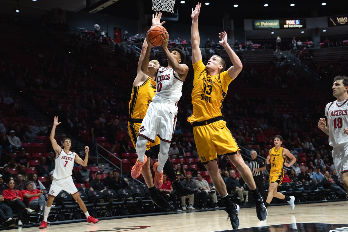 SDSU guard David Torresani (0) goes up for a layup during an NCAA basketball exhibition game against Long Beach State, Wednesday October 28, 2026 in San Diego, California. SDSU guard David Torresani (0) goes up for a layup during an NCAA basketball exhibition game against Long Beach State, Wednesday October 28, 2026 in San Diego, California.