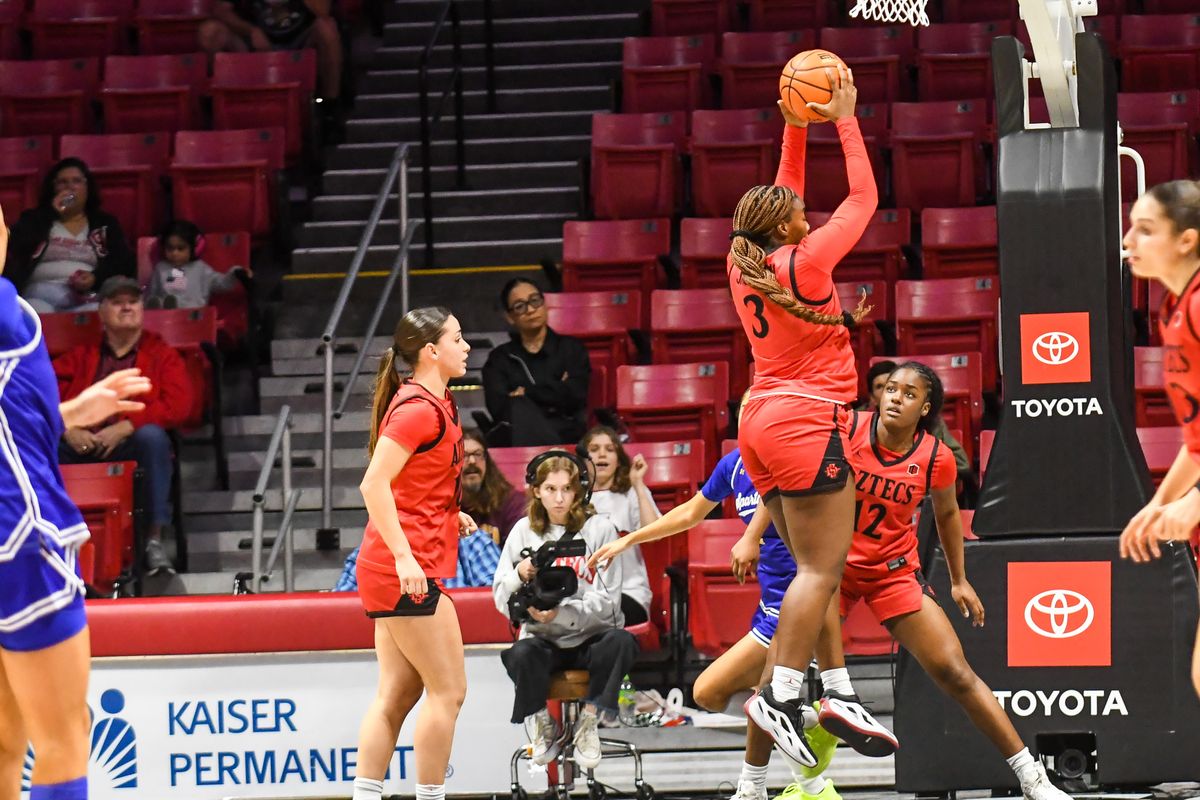 SDSU guard Alyssa Jackson (3) grabs a rebound during an NCAA Women’s basketball  game against San Jose State   Saturday January 24, 2026 in  San Diego, California.