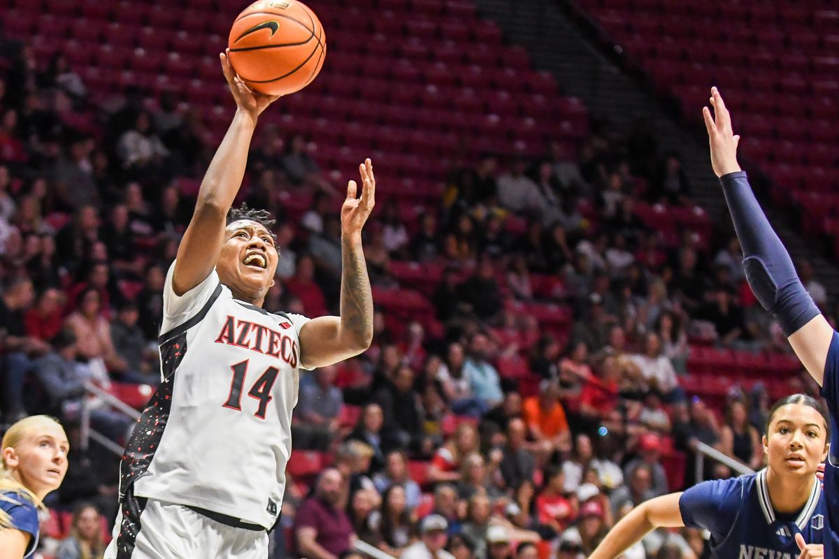 SDSU guard Nala Williams (14) shoots the ball during an NCAA basketball  game against Nevada Saturday January 31, 2026 in  San Diego, California.