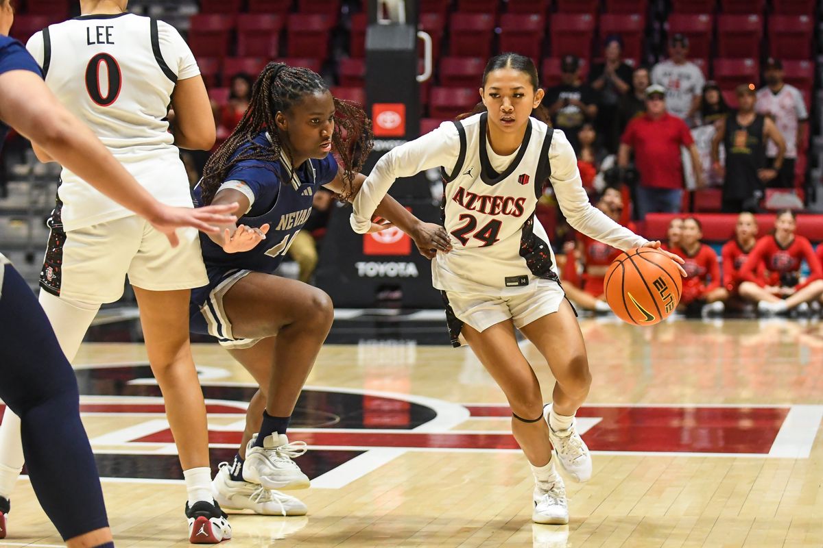SDSU guard Naomi Panganiban (24) bring the ball up the floor during an NCAA basketball  game against Nevada Saturday January 31, 2026 in  San Diego, California.