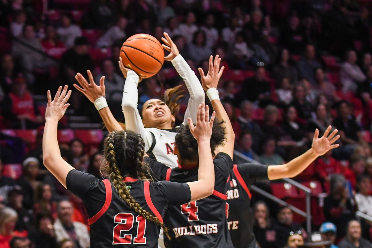 SDSU guard Naomi Panganiban (24) shoots the ball  during an NCAA Women’s Basketball game against Fresno State Saturday February 21, 2026 in San Diego, California.