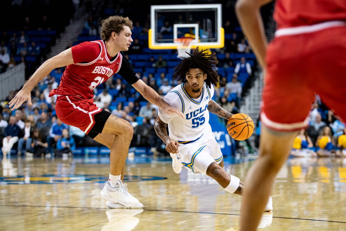 UCLA Bruins guard Skyy Clark (55) runs the ball past defense during the 1st half of the game against Boston University Terriers on Monday, November 11th, 2024, at Pauley Pavilion in Los Angeles, CA.