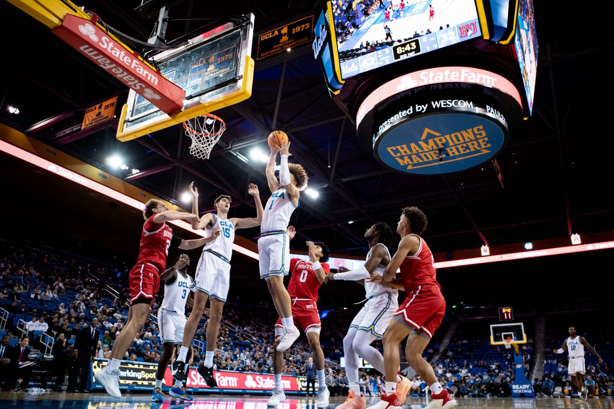 UCLA Bruins guard Trent Perry (1) jumps to grab rebounded ball during the 2nd half of the game against Boston University Terriers on Monday, November 11th, 2024, at Pauley Pavilion in Los Angeles, CA.