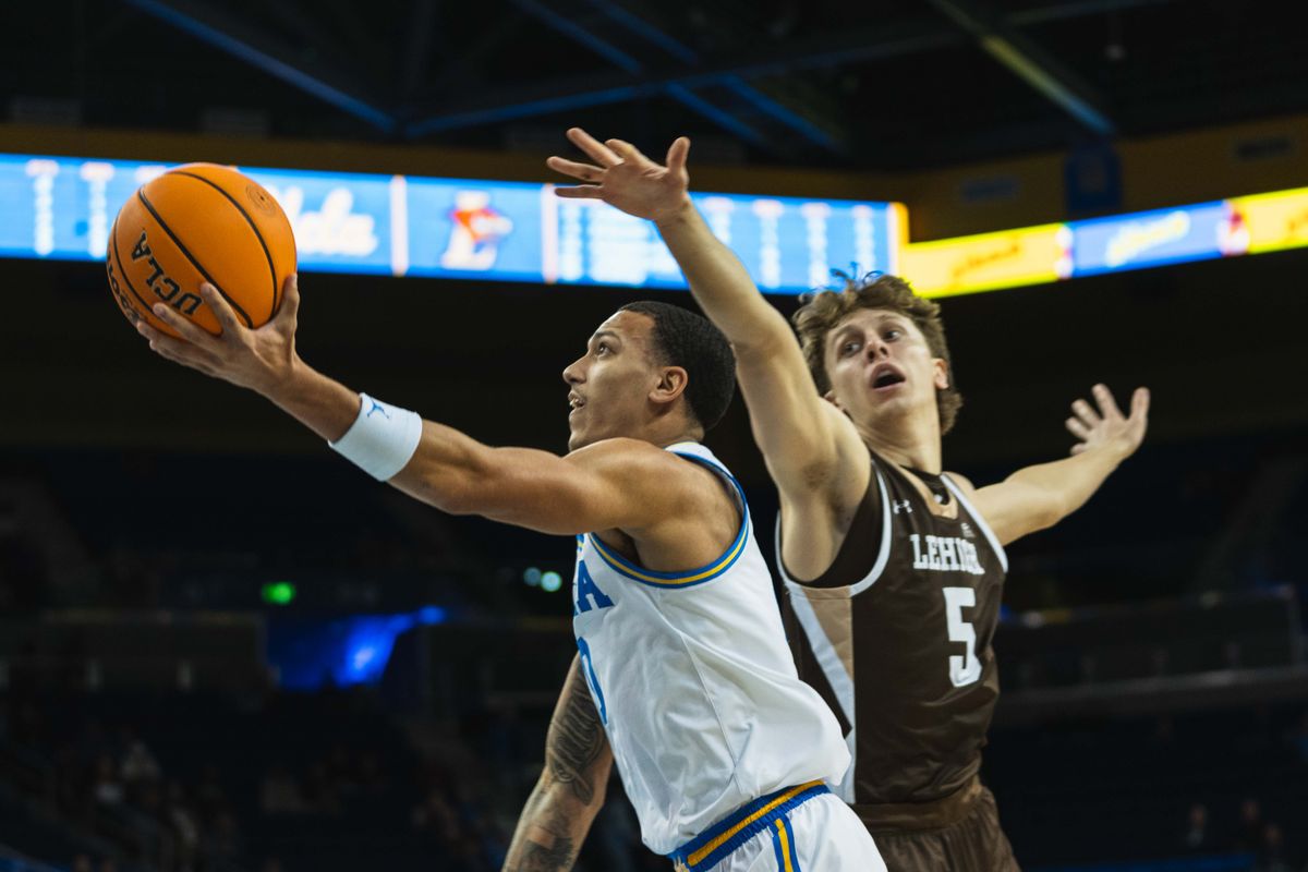 UCLA Bruins Guard Kobe Johnson (0) driving in during an NCAA basketball game against Lehigh, Friday November 15th, 2024 in Los Angeles, California. 