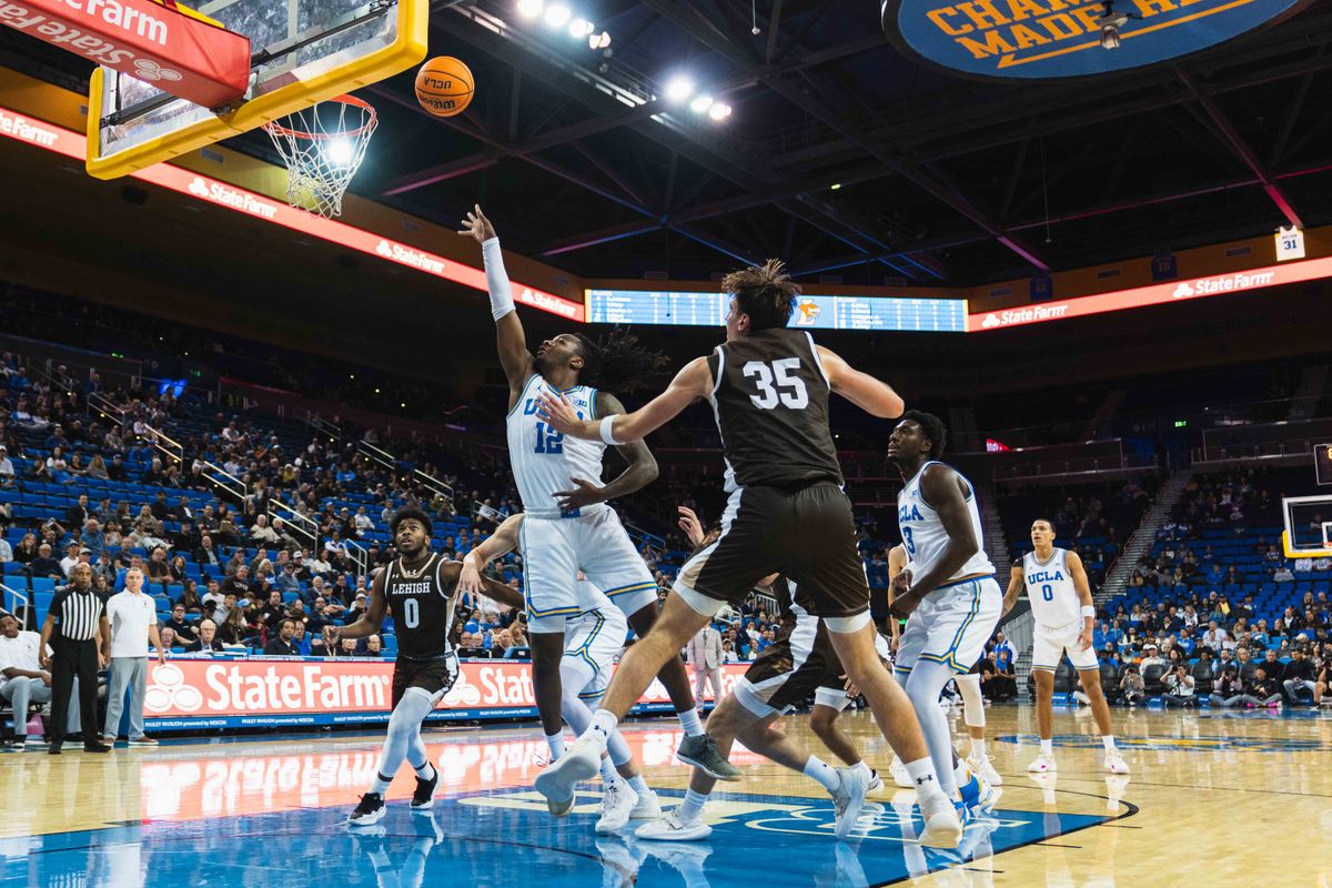 UCLA Bruins Guard Sebastian Mack (12) shooting a floater during an NCAA basketball game against Lehigh, Friday November 15th, 2024 in Los Angeles, California.
