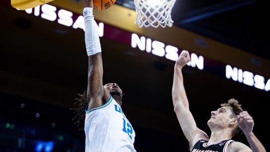 UCLA Bruins guard Sebastian Mack (12) goes for a layup during the 1st half of the game against the Idaho State Bengals on Wednesday, November 20th, 2024, at Pauley Pavilion in Los Angeles, CA.