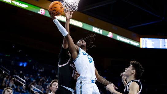 UCLA Bruins guard Sebastian Mack (12) jumps for a layup during the 1st half of the game against the Idaho State Bengals on Wednesday, November 20th, 2024, at Pauley Pavilion in Los Angeles, CA.