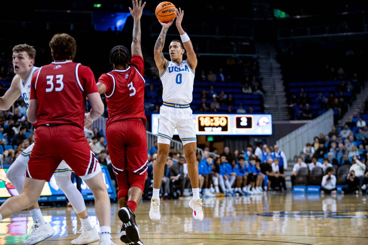 UCLA Bruins guard Kobe Johnson (0) shoots a three-pointer during the 1st half of the game against Southern Utah on Tuesday, November 26th, 2024, at Pauley Pavilion in Los Angeles, CA. UCLA Bruins guard Kobe Johnson (0) shoots a three-pointer during the 1st half of the game against Southern Utah on Tuesday, November 26th, 2024, at Pauley Pavilion in Los Angeles, CA.