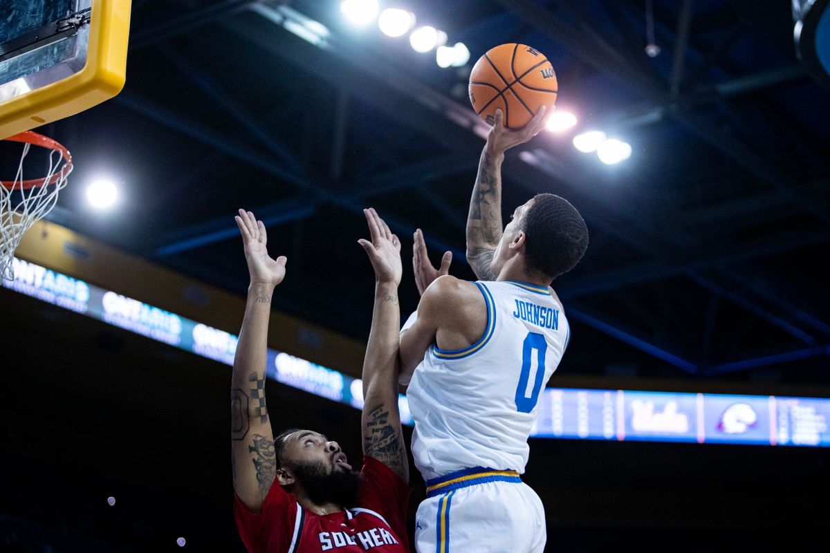 UCLA Bruins guard Kobe Johnson (0) jumps for a two-pointer during the 1st half of the game against Southern Utah on Tuesday, November 26th, 2024, at Pauley Pavilion in Los Angeles, CA. UCLA Bruins guard Kobe Johnson (0) jumps for a two-pointer during the 1st half of the game against Southern Utah on Tuesday, November 26th, 2024, at Pauley Pavilion in Los Angeles, CA.