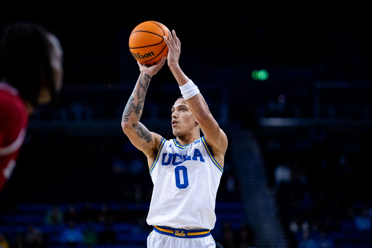 UCLA Bruins guard Kobe Johnson (0) shoots a three-pointer during the 1st half of the game against Southern Utah on Tuesday, November 26th, 2024, at Pauley Pavilion in Los Angeles, CA. UCLA Bruins guard Kobe Johnson (0) shoots a three-pointer during the 1st half of the game against Southern Utah on Tuesday, November 26th, 2024, at Pauley Pavilion in Los Angeles, CA.