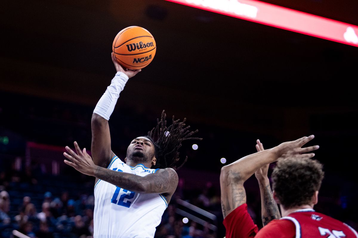 UCLA Bruins guard Sebastian Mack (12) jumps for a layup during the 1st half of the game against Southern Utah on Tuesday, November 26th, 2024, at Pauley Pavilion in Los Angeles, CA. UCLA Bruins guard Sebastian Mack (12) jumps for a layup during the 1st half of the game against Southern Utah on Tuesday, November 26th, 2024, at Pauley Pavilion in Los Angeles, CA.