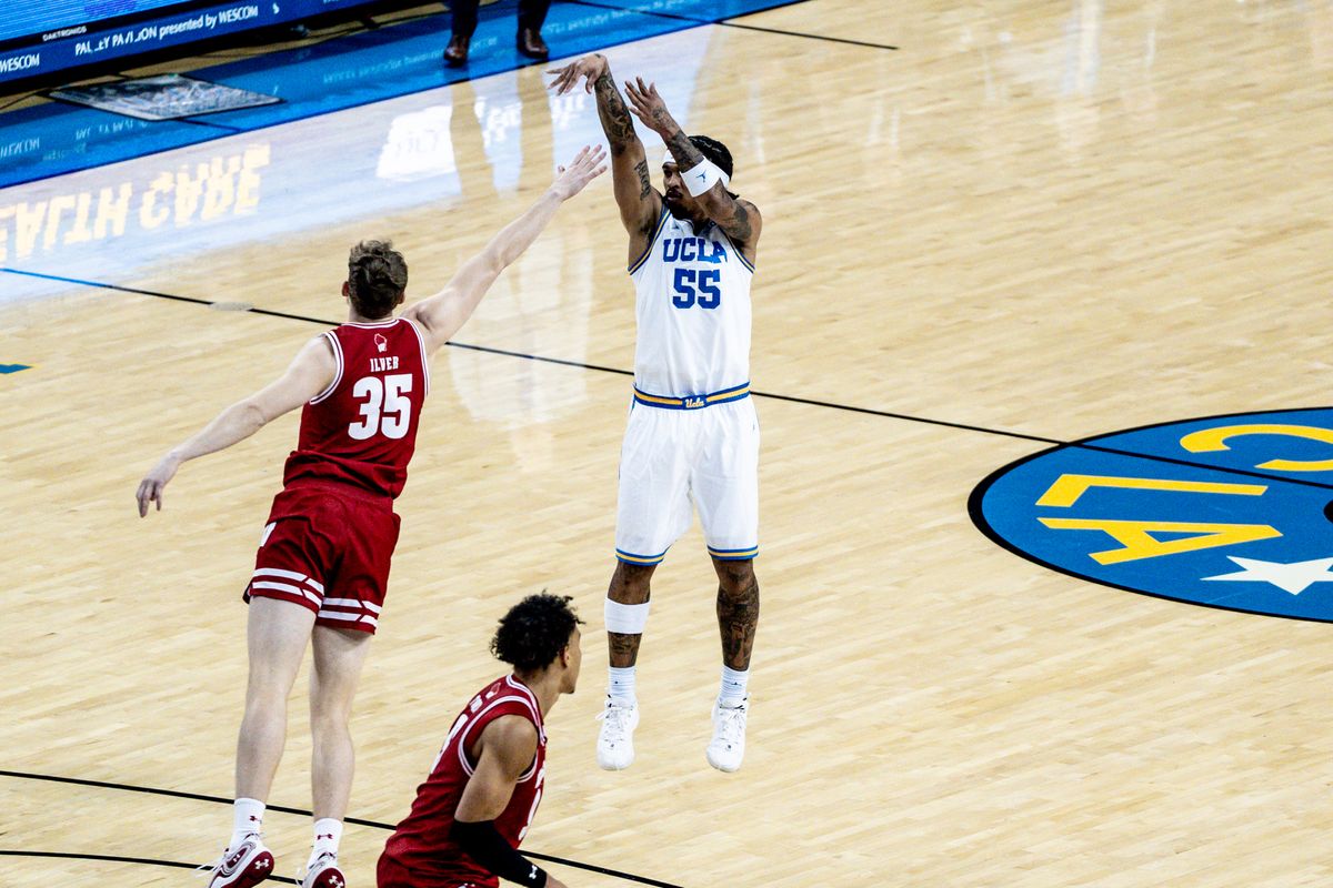 UCLA Bruins G Skyy Clark (55) shoots a three pointer in the game against Wisconsin on Tuesday, January 21, 2025, at Pauley Pavilion in Los Angeles, CA.