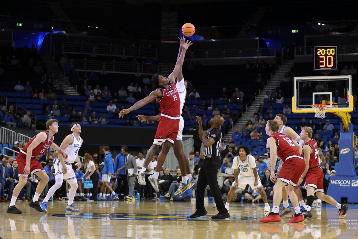 Forward Kiree Huie #15 of the Eastern Washington Eagles and forward Xavier Booker #1 of the UCLA Bruins jump for the opening tip during an NCAA basketball game, Monday November 3, 2025 in Los Angeles, Calif. Forward Kiree Huie #15 of the Eastern Washington Eagles and forward Xavier Booker #1 of the UCLA Bruins jump for the opening tip during an NCAA basketball game, Monday November 3, 2025 in Los Angeles, Calif.