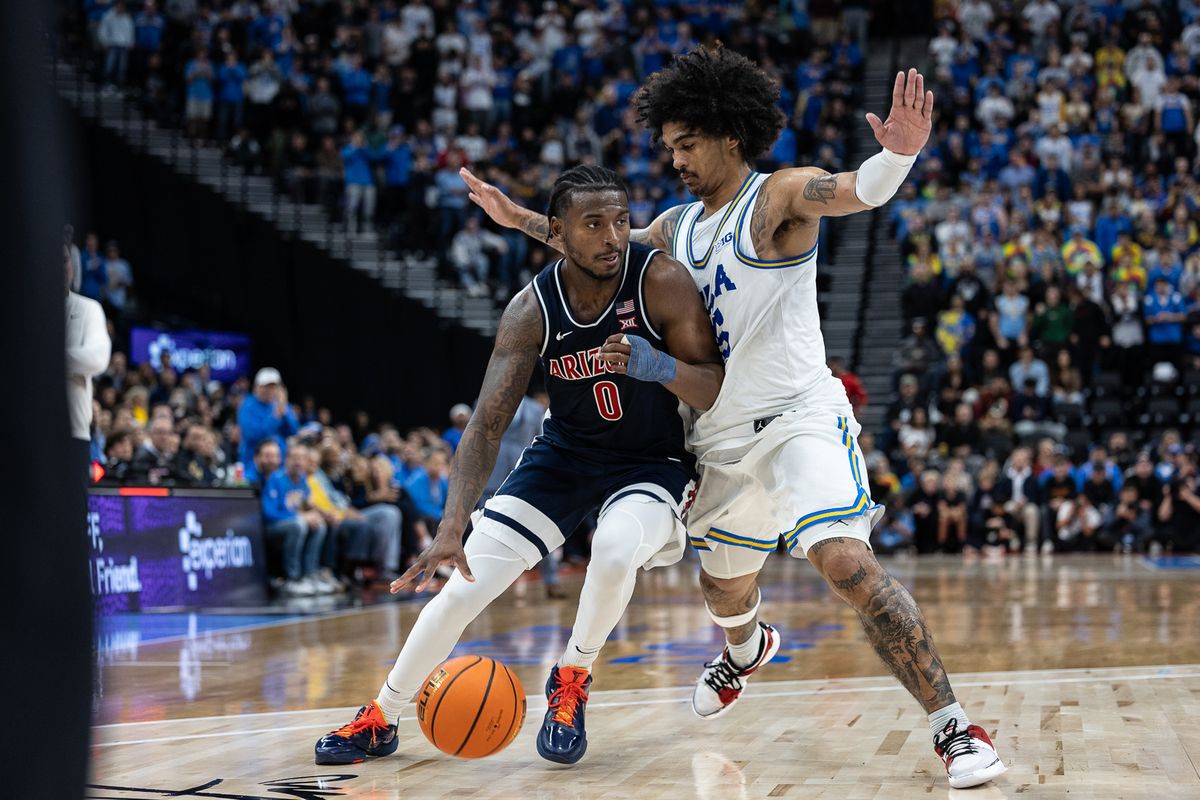 UCLA guard Skyy Clark (55) defends during a Big Ten Conference college basketball game against the Arizona Wildcats, Friday November 14, 2025 in Inglewood, Calif.