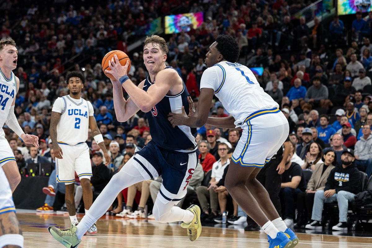 UCLA forward Xavier Booker (1) defends during a Big Ten Conference college basketball game against the Arizona Wildcats, Friday November 14, 2025 in Inglewood, Calif.