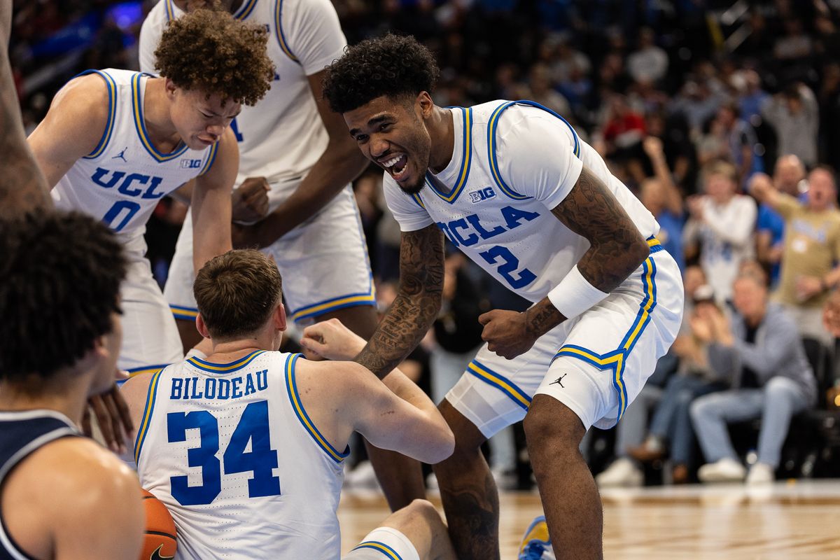 UCLA guard Donovan Dent (2) celebrates during a Big Ten Conference college basketball game against the Arizona Wildcats, Friday November 14, 2025 in Inglewood, Calif.