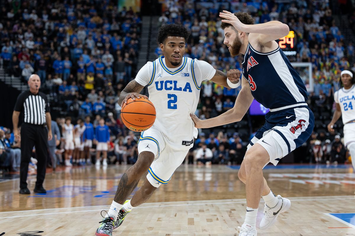 UCLA guard Donovan Dent (2) drives to the basket during a Big Ten Conference college basketball game against the Arizona Wildcats, Friday November 14, 2025 in Inglewood, Calif.