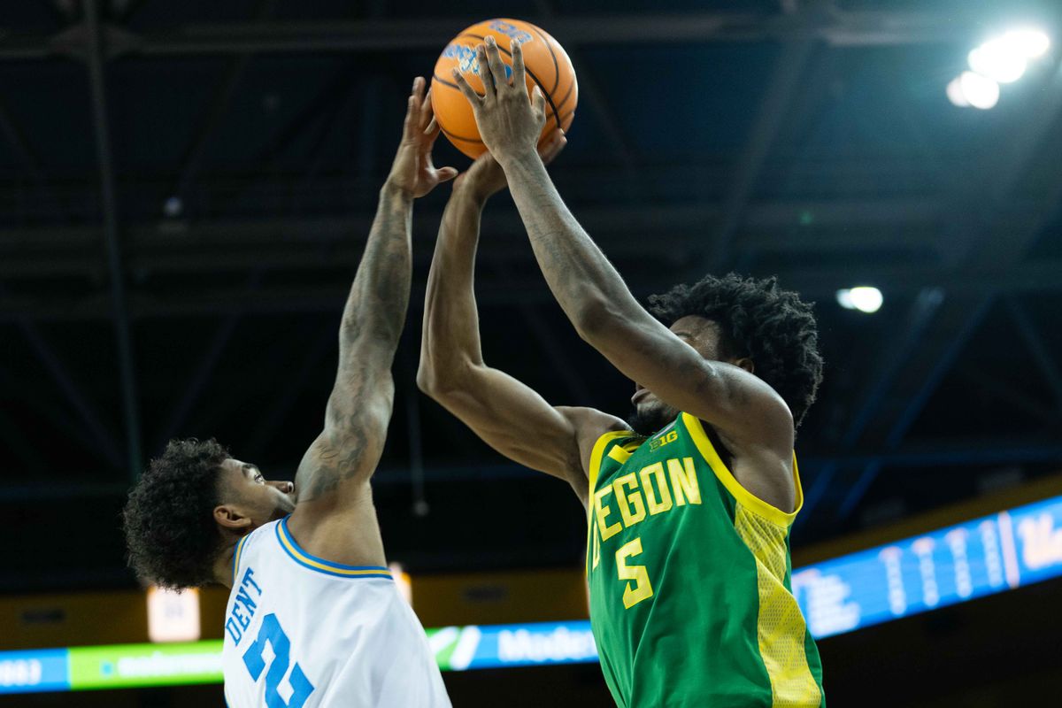 UCLA guard Donovan Dent (2) blocks a jumpshot during a Big 10 basketball game against the University of Oregon, Saturday, December 6th, 2025 in Los Angeles, California