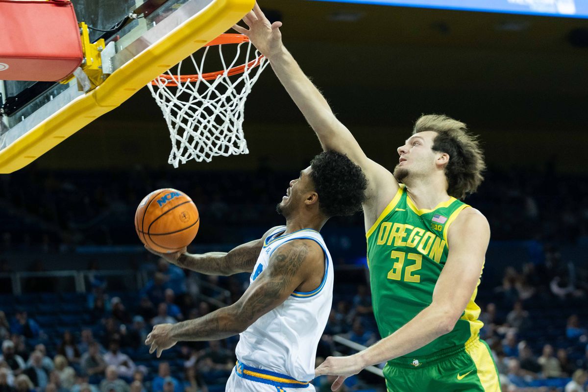 UCLA guard Donovan Dent (2) attacks the basket during a Big 10 basketball game against the University of Oregon, Saturday, December 6th, 2025 in Los Angeles, California