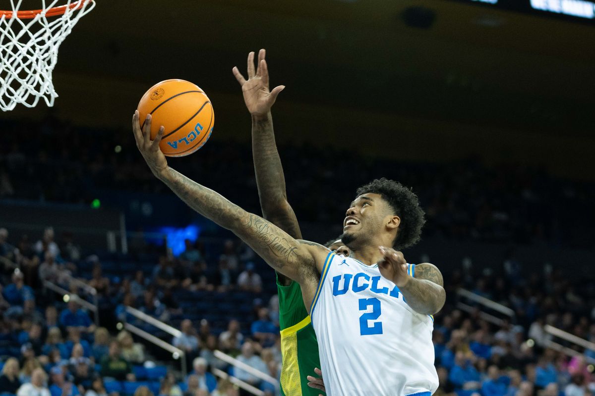 UCLA guard Donovan Dent (2) attacks the basket during a Big 10 basketball game against the University of Oregon, Saturday, December 6th, 2025 in Los Angeles, California