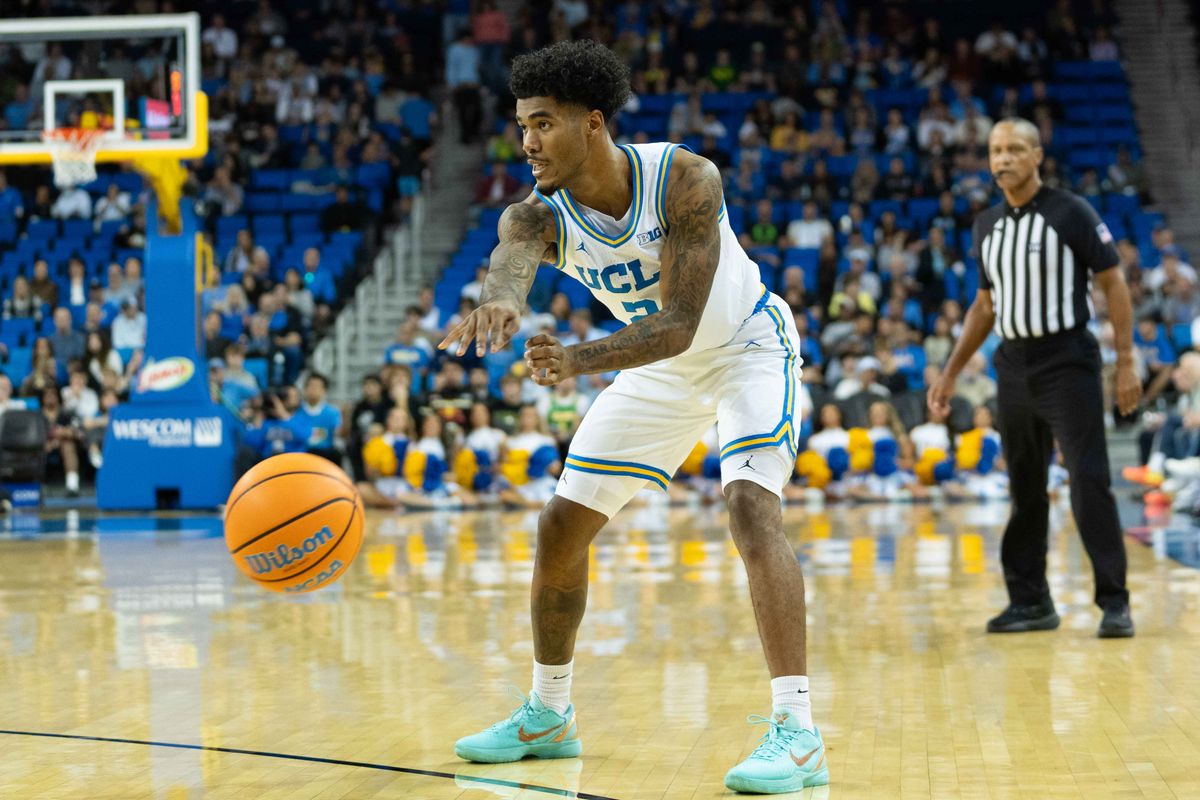 UCLA guard Donovan Dent (2) sets up the offense during a Big 10 basketball game against the University of Oregon, Saturday, December 6th, 2025 in Los Angeles, California