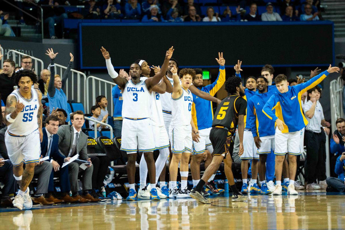 UCLA bench celebrates a made three-pointer during a Big 10 basketball game against ASU, Wednesday, December 17th, 2025 in Los Angeles, California