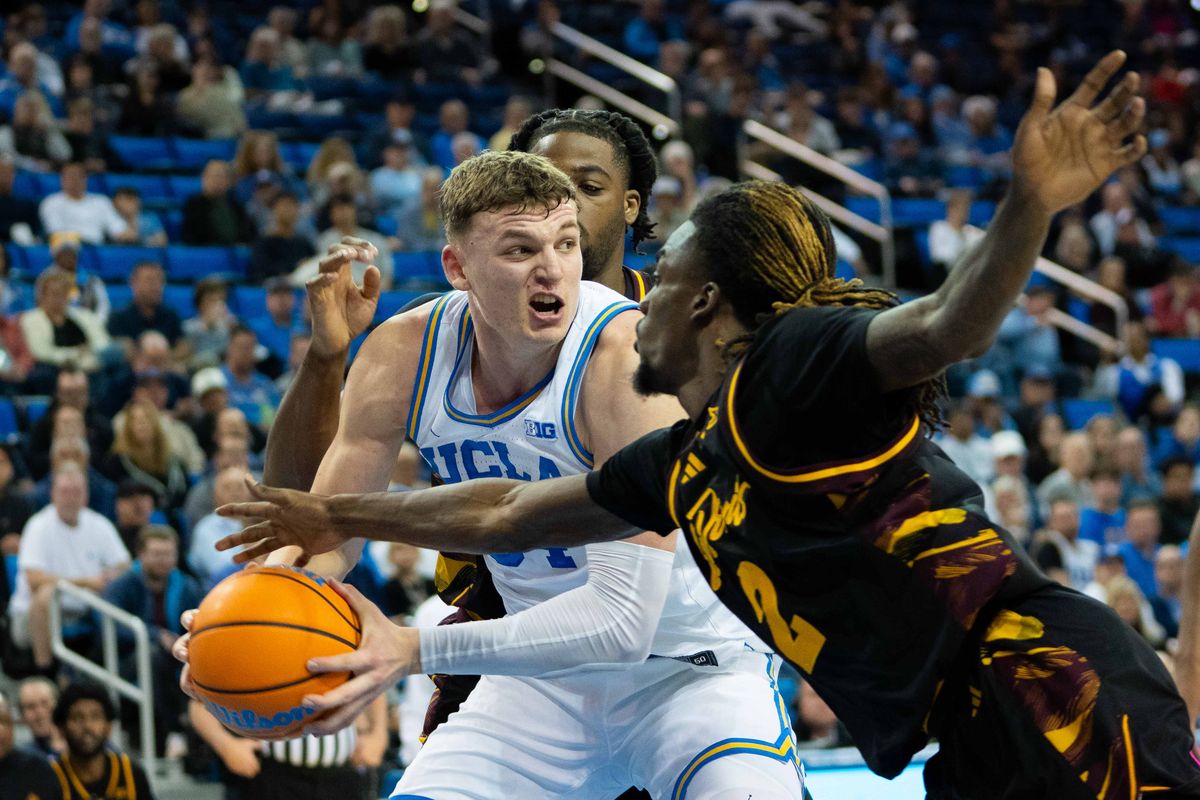 UCLA forward Tyler Bilodeau (34) looks for the open teammate during a Big 10 basketball game against ASU, Wednesday, December 17th, 2025 in Los Angeles, California