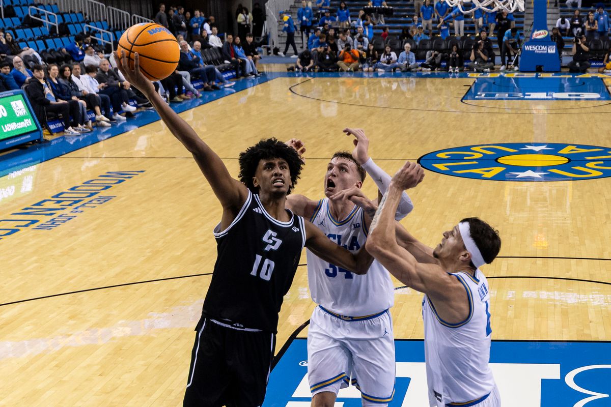 Hamas Mousa #10 of the Cal Poly Mustangs lays the ball up during an NCAA basketball game against the UCLA Bruins, Friday December 19, 2025 in Los Angeles, Calif.