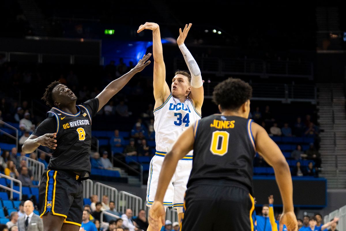 UCLA forward Tyler Bilodeau (34) shoots a three during an NCAA basketball game against UC Riverside, Tuesday December 23rd, 2025 in Los Angeles, California.